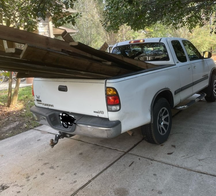 Junk in the back of a white truck